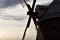 Wind mill detail, clapboard shingle wooden roof and four wooden wind shoulders