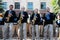 Wind orchestra musicians in black Ukrainian embroidered shirts play saxophones and flutes at a festival in Dnepropetrovsk