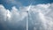 Wind power generators on sky background. 4K