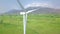 Wind power turbines aerial landscape. Windmill turbine generating clean renewable energy in green agricultural field