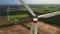 Wind power turbines - Sustainable, renewable energy concept.