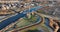 Wind powerd polder windmill, wind engine pumping water. Ground sailer, pumping water towards polders. Aerial. Overhead