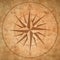 Wind rose on old brown grunge paper