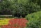 Wind sculptures in a colorful flower bed in the Dallas Arboretum and Botanical Garden