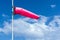 Wind sock on a pole on board a construction work barge at oil field