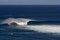 Wind surfer at Peahi or Jaws surf break, Maui, Hawaii, USA