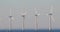 Wind tubines at sea, heat haze