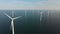 Wind turbine from aerial view, Drone view at windfarm Westermeerdijk a windmill farm in the lake IJsselmeer the biggest