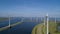 Wind turbine from aerial view, Drone view at windpark krammersluizen a windmill farm in the lake grevelingen in the Netherlands,