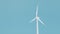Wind turbine against bright blue sky, Power environmental technology industry.
