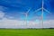 Wind Turbine for alternative energy in green rice field. Eco power.