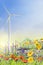 Wind turbine background with flowers on blue sky