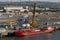 Wind turbine blade assembly area and loading cargo ship in Belfast Docks Northern Ireland.