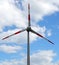 Wind turbine in the blue sky