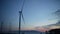 Wind turbine clean energy electricity silhouette on the mountain