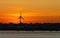 Wind Turbine dominating the skyline at dusk in Slade Green near dartford along the Thames Estuary, Kent England