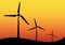 Wind turbine icons on a colorful sunset sky