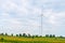 Wind turbine made Renewable Energy on field, blue sky and cloud background at Chaiyaphum Thailand