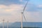 Wind turbine renewable energy source summer in forest mountains landscape energy transmission distribution equipment in natural