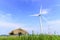 The wind turbine on the rice farm and the hut