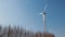 Wind turbine with rotation of the three rotor blades and changing the position of the installation in the wind on the