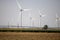 A wind turbines across Nebraska farm lands