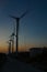 Wind turbines in action at sunset