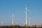 Wind turbines against blue sky