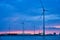 Wind turbines in Antwerp port in the evening