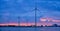 Wind turbines in Antwerp port in the evening