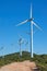 Wind turbines on beautiful sunny summer mountain landscape