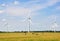 Wind turbines blue clouded sky