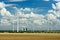 Wind Turbines and Coal Power Plant under Stormy Sky