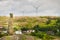 Wind turbines farm on coast hills