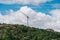 Wind turbines farm on coast hills