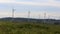 Wind turbines farm landscape on clouds