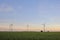 Wind turbines in field. Alternative energy sources. Natural energy.Environmentally friendly natural energy .