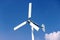 Wind turbines generating electricity with blue sky - energy conservation concep