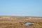 Wind turbines on high pennine moorland taken from midgley moor with peat bog ponds and pennine landscape