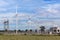 Wind turbines with high voltage electrical power pylon substation for renewable wind energy