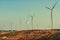 wind turbines on the hill with sunshine