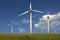 Wind turbines on a meadow green energy