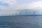 Wind turbines in sea in Copenhagen, Denmark. Offshore wind farm for renewable sustainable and alternative energy