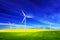 Wind turbines on spring field. Alternative, clean energy