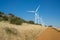 Wind turbines and track in the countryside