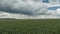 Wind turbines under a partly cloudy sky