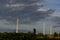 Wind turbines or windmills generating electricity. Renewable electric energy production. Vienna.