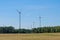 Wind turbines / windmills in rural landscape - renewable energy