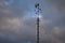 The wind vane and the dark,gloomy cloudy sky