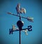 Wind weathervane that marks the way forward with the arrows